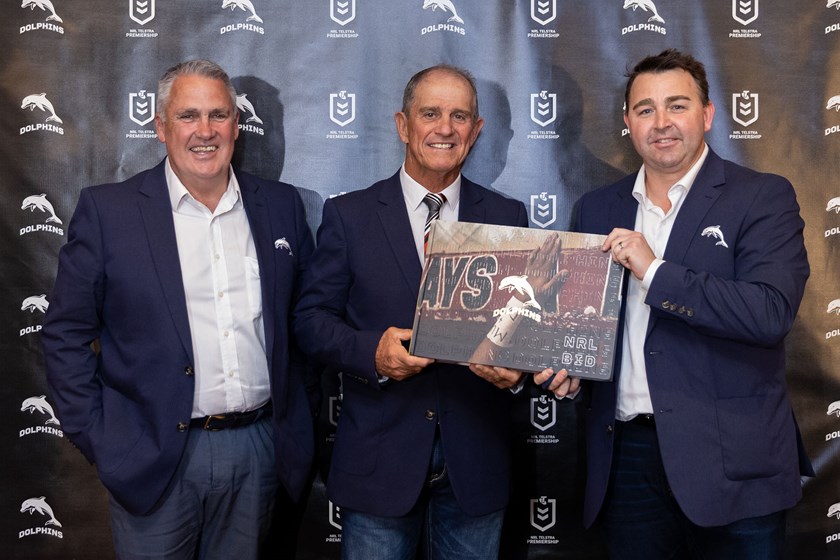 Anthony Murphy, Bob Jones and Terry Reader with the Dolphins Bid Book